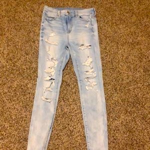 Blue mid-rise ripped jeans